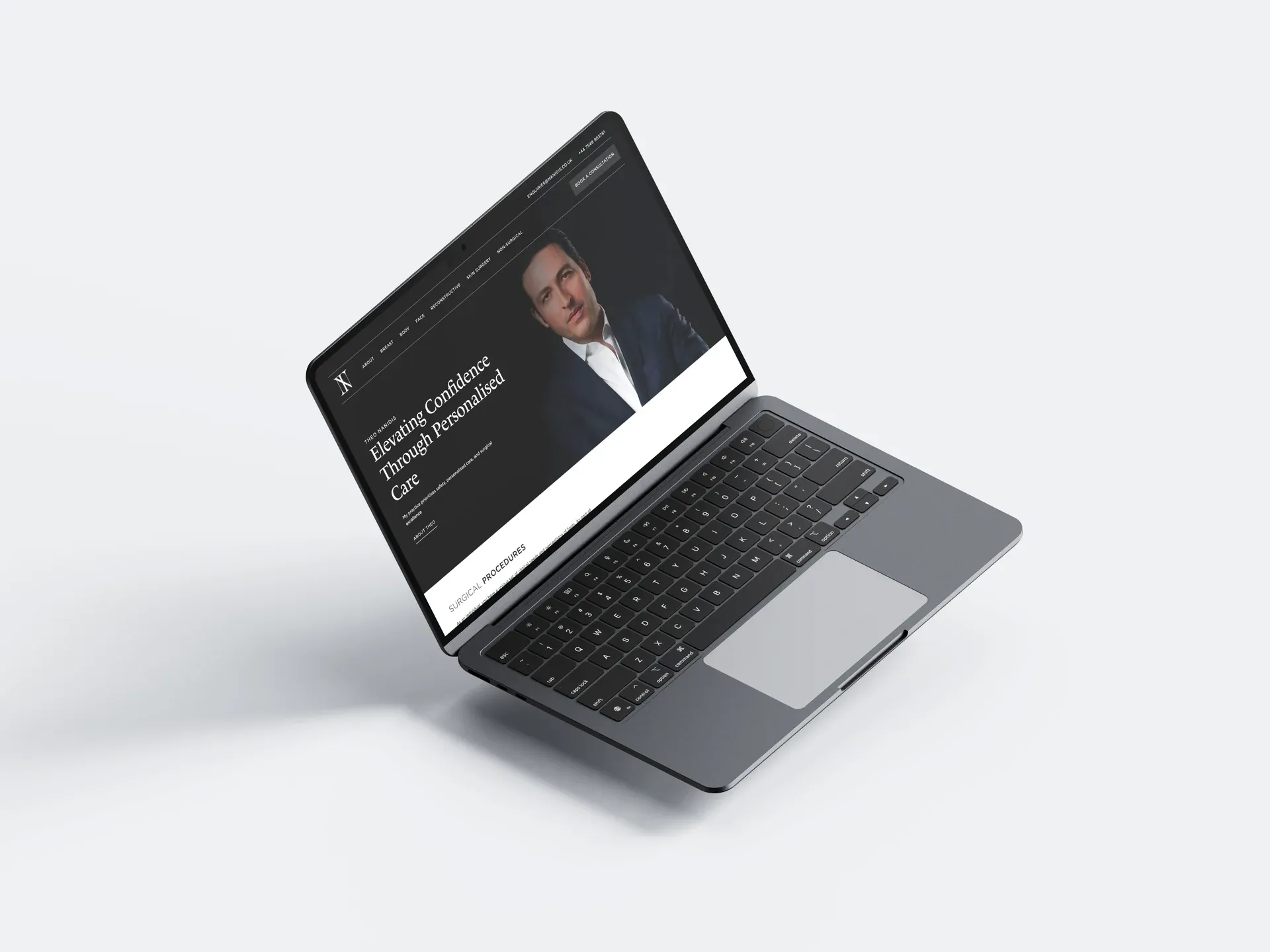 The Nanidis Plastic Surgery website shown on a laptop screen